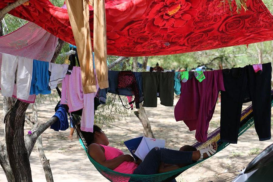 Person laying in a hammock at MPP Camp, Matamoros, Tamaulipas, Mexico, 2019